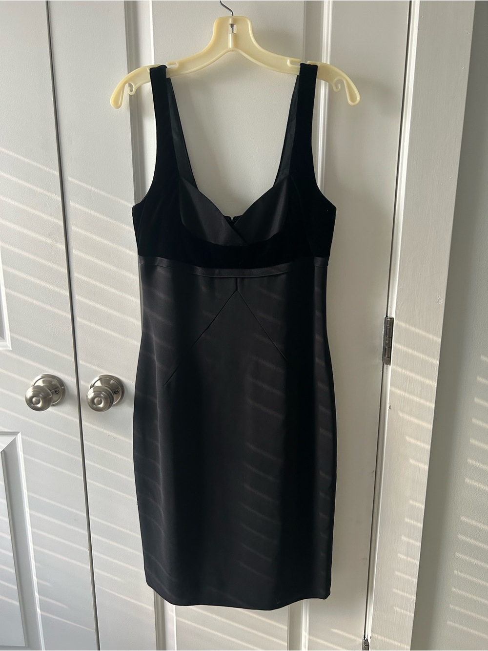 Classic Black Sleeveless Sheath Dress